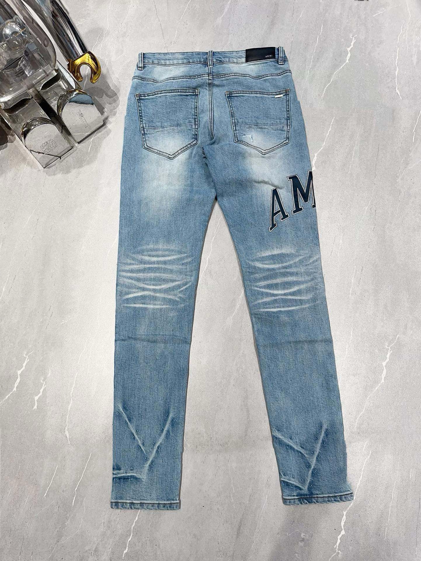 AmirI Jeans with Black Holes lightblue Color