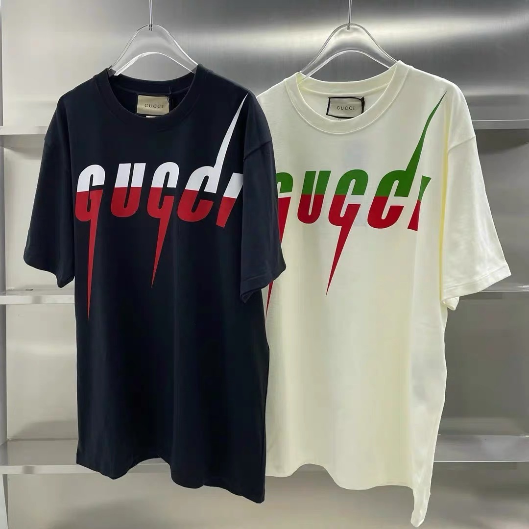 Gucci lighting black and cream color tees