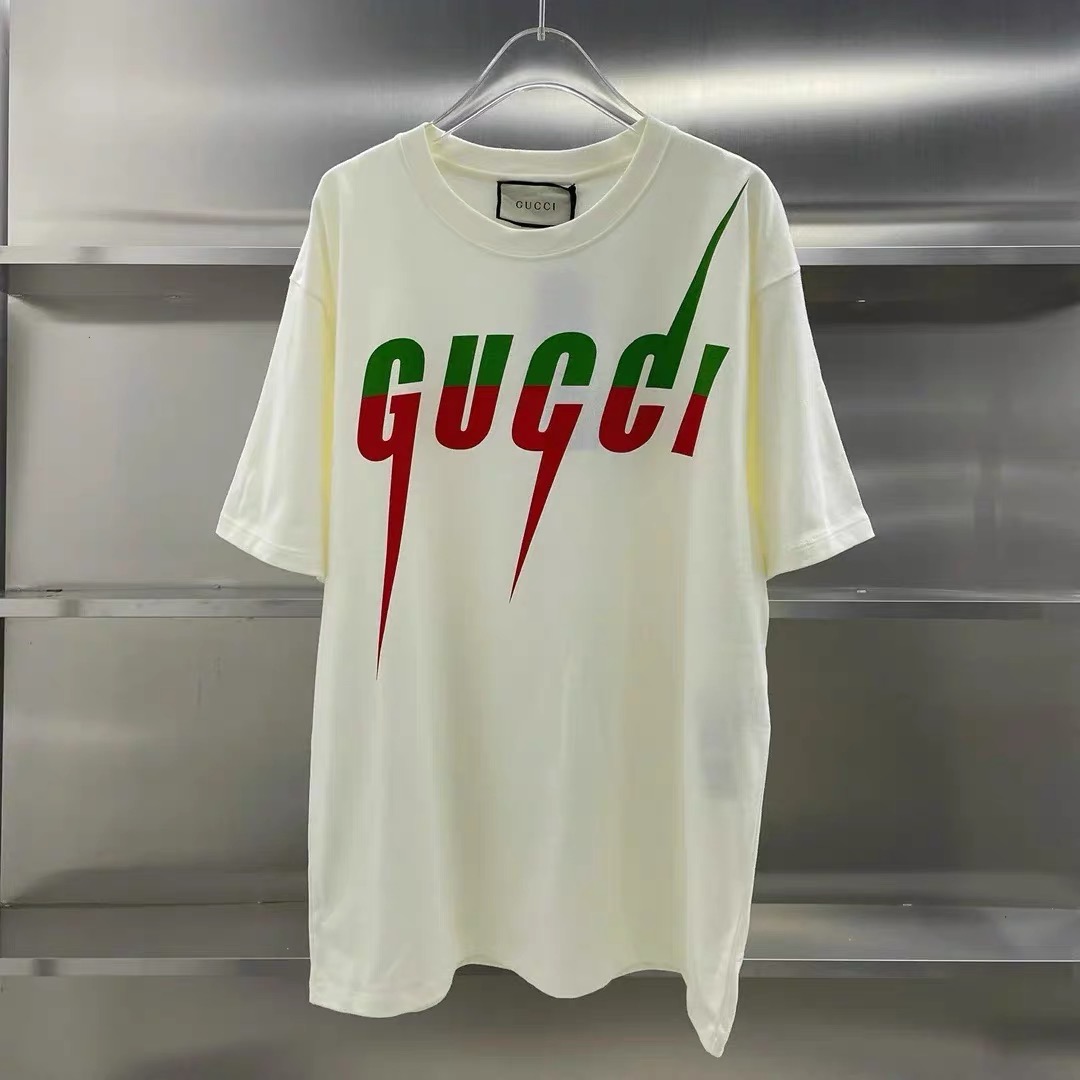 Gucci lighting black and cream color tees