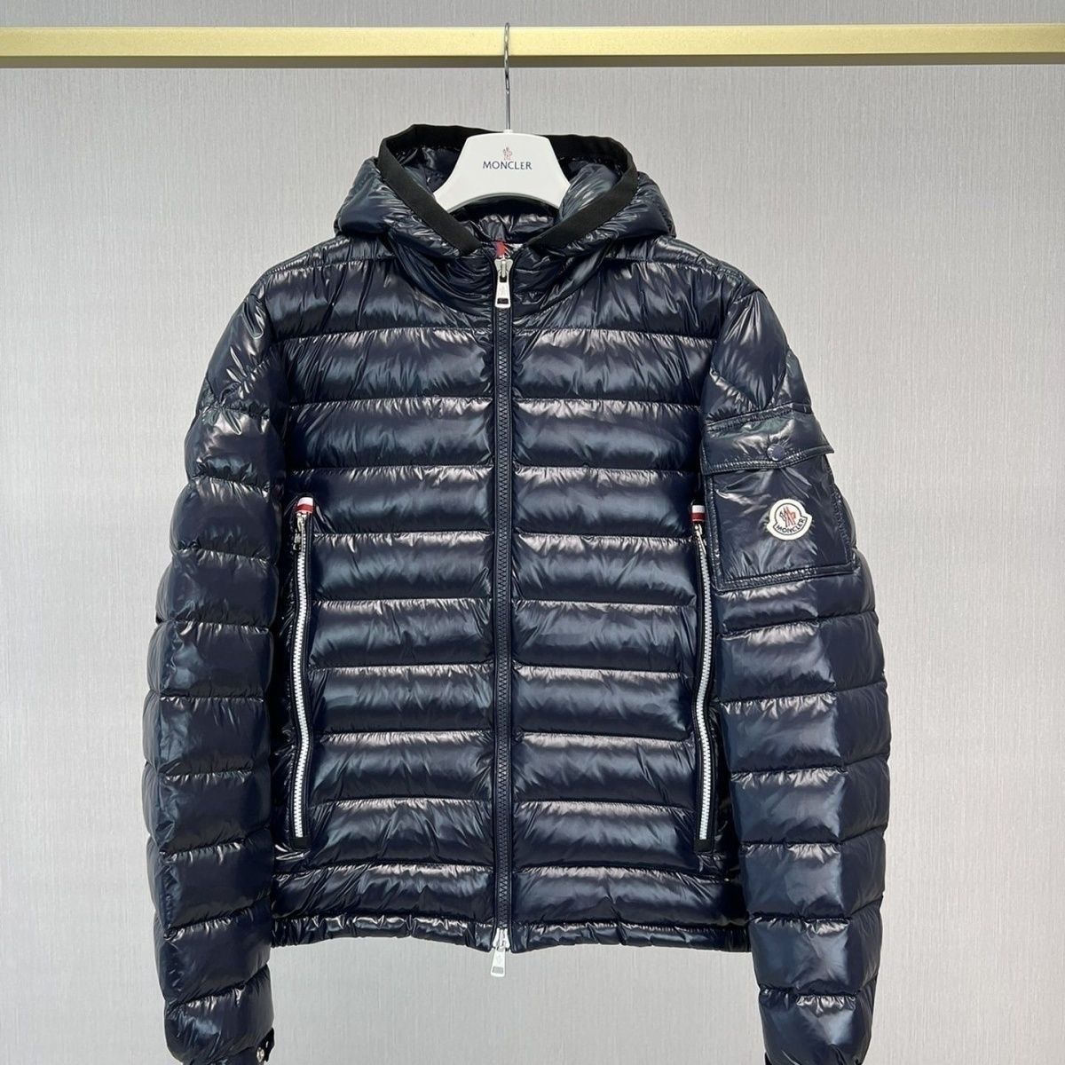 moncler The straight-cut Galion hooded down jacket and the thin down jacket with square quilting.